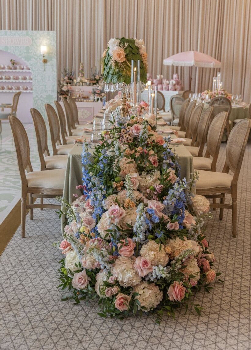 Pastel Floral Runner - Cascading pastel rose, hydrangea and delphinium runner spilling onto the floor by Aura Design Flowers Miami
