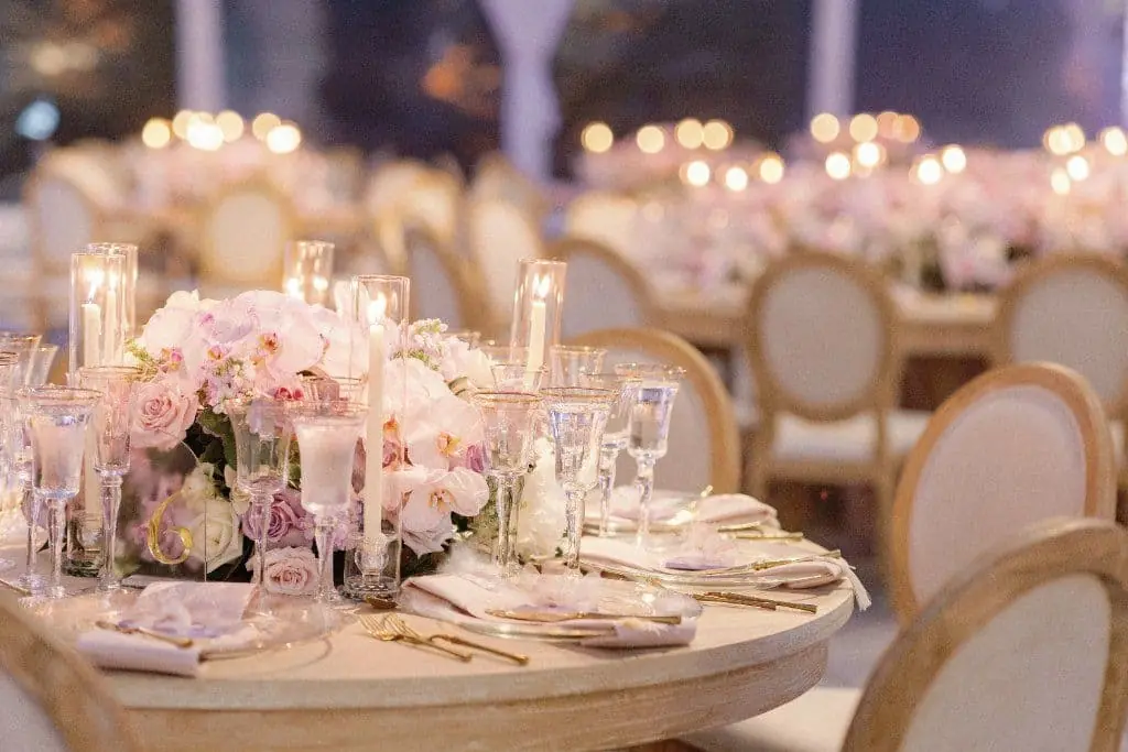 Elegant gold and blush floral centerpiece at Vizcaya Museum wedding Miami