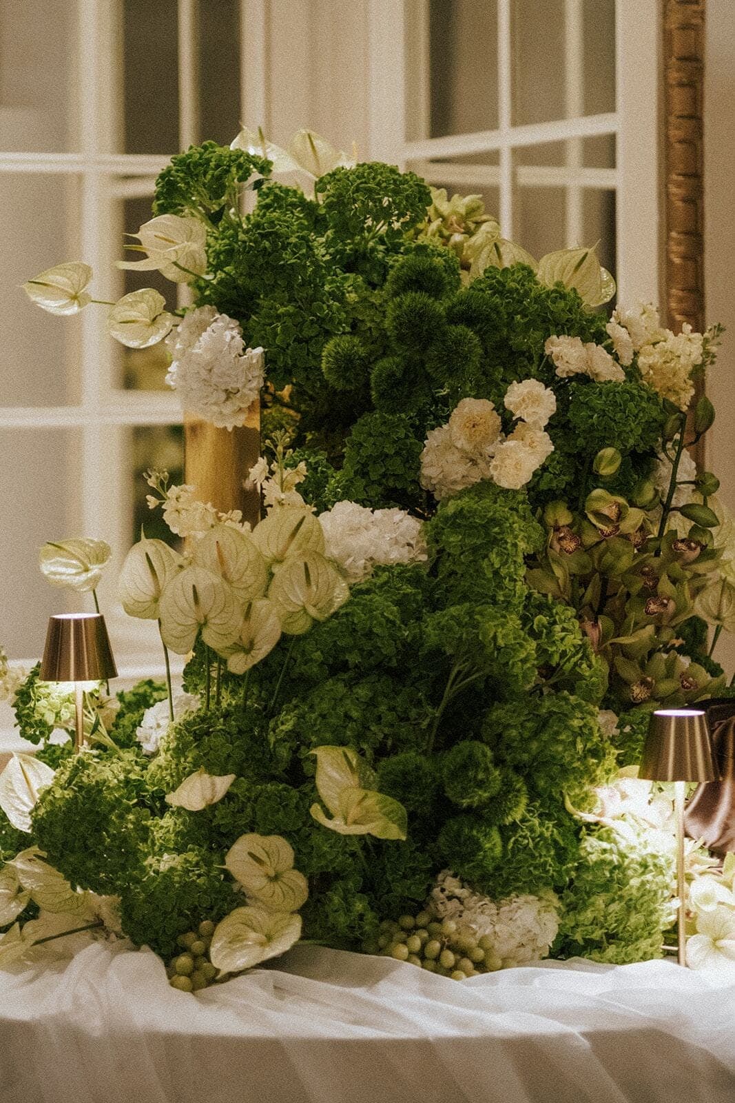 Green & Ivory Installation - Sculptural green hydrangea and white anthurium installation by Aura Design Flowers Miami