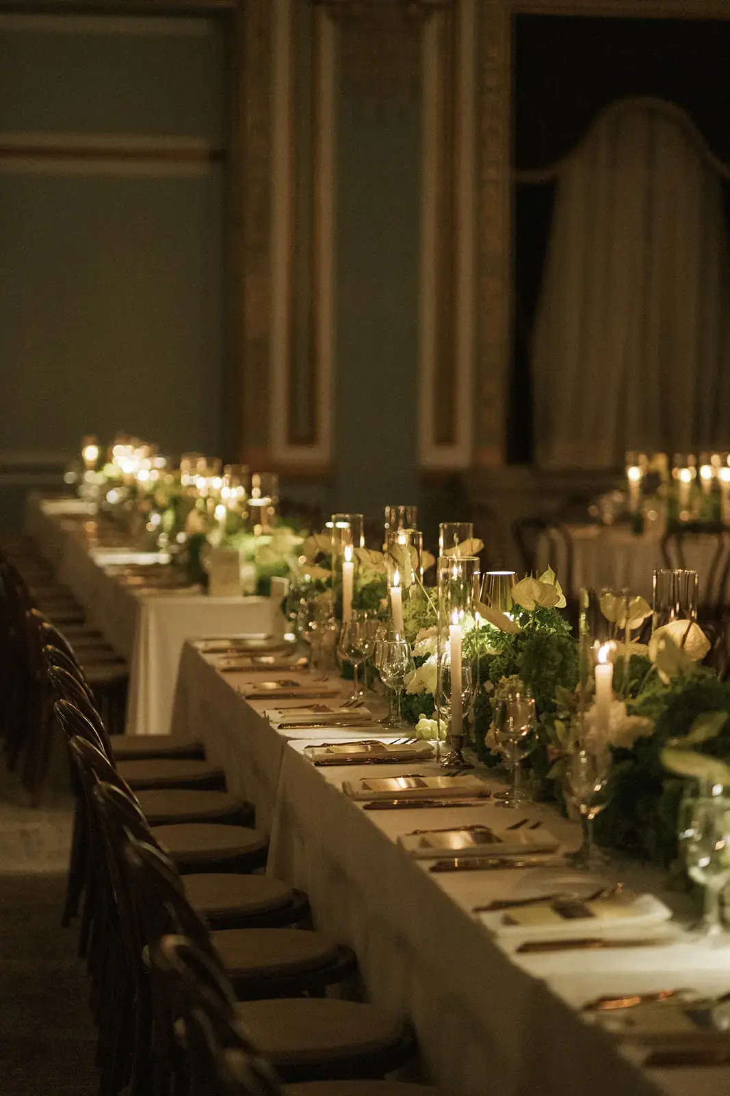 Floral run along the full length of a reception table, designed as one continuous environment